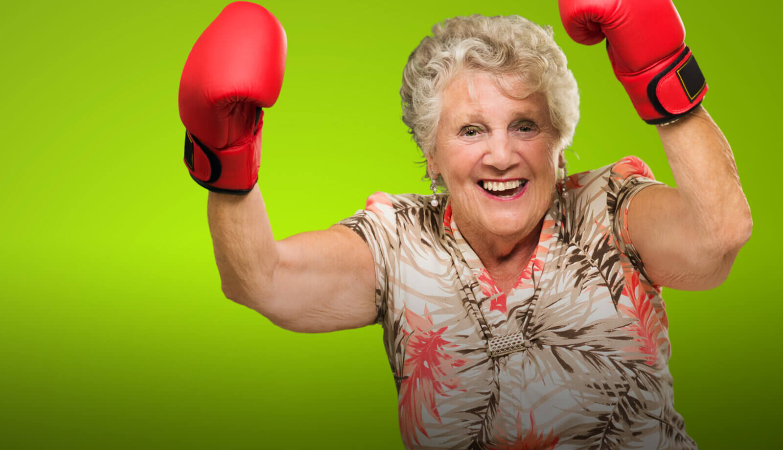 Energise Me website main image - older lady in boxing gloves